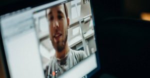 On the blurred background during a meeting: 