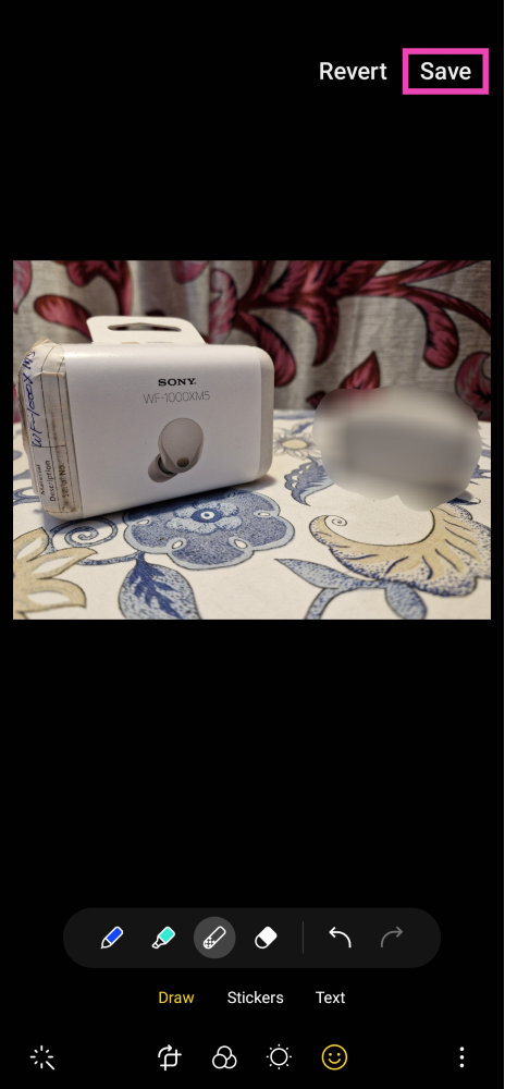Step 5: Draw over the parts of the picture you want to blur out on your Android smartphone.
