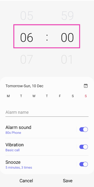 Step 4: Set a time for the alarm. You can do this by swiping up and down on the hour and minute dials.