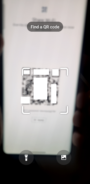 Step 4: Once the scanner pops up, point your phone's camera to the QR code.