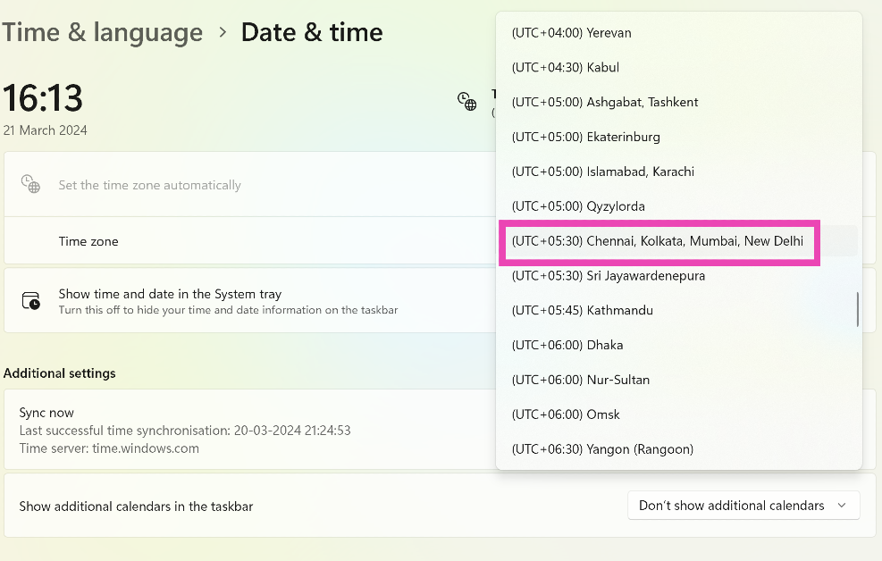Step 3: Click on the dropdown menu next to Time zone and select the appropriate option.