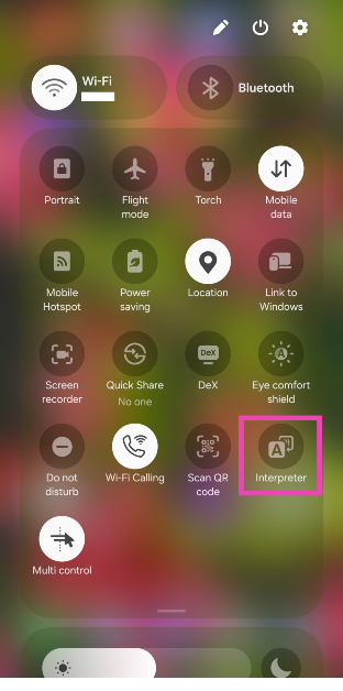 Step 1: Swipe down from the top-right corner of the screen and select the Interpreter tile from the Quick Settings Menu. Alternatively, you can select Interpreter from the edge panel.