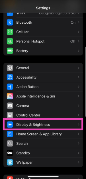 Step 1: Go to Settings and select Display & Brightness. Top 9 ways to fix ‘Camera Control button not working’ on iPhone 16