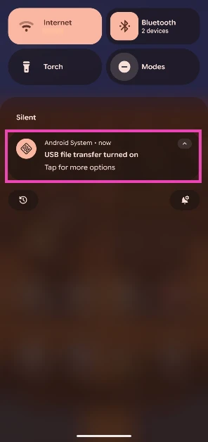 Step 1: Swipe down from the status bar and tap on the USB notification.