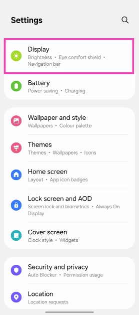Step 1: On your Samsung smartphone, go to Settings and select Display.
