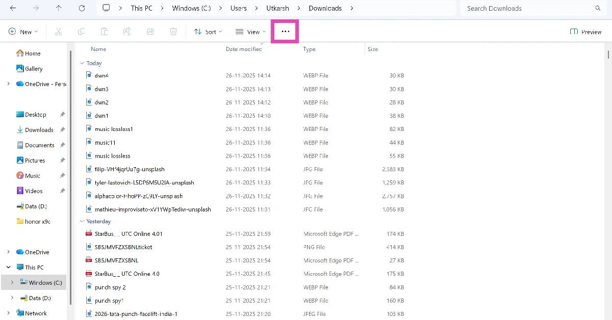 Step 1: Go to the Downloads folder and hit the ellipses in the top menu.