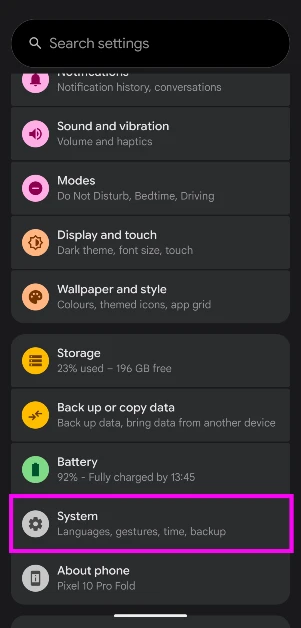 Step 2: Scroll down and select System.