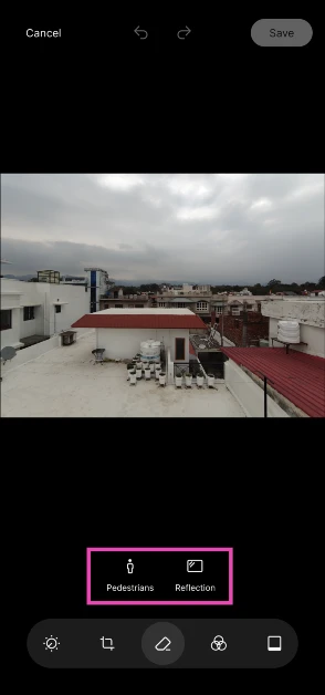 Choose whether you want to remove reflections or pedestrians from the picture. The AI Eraser does not let you manually select objects yet.